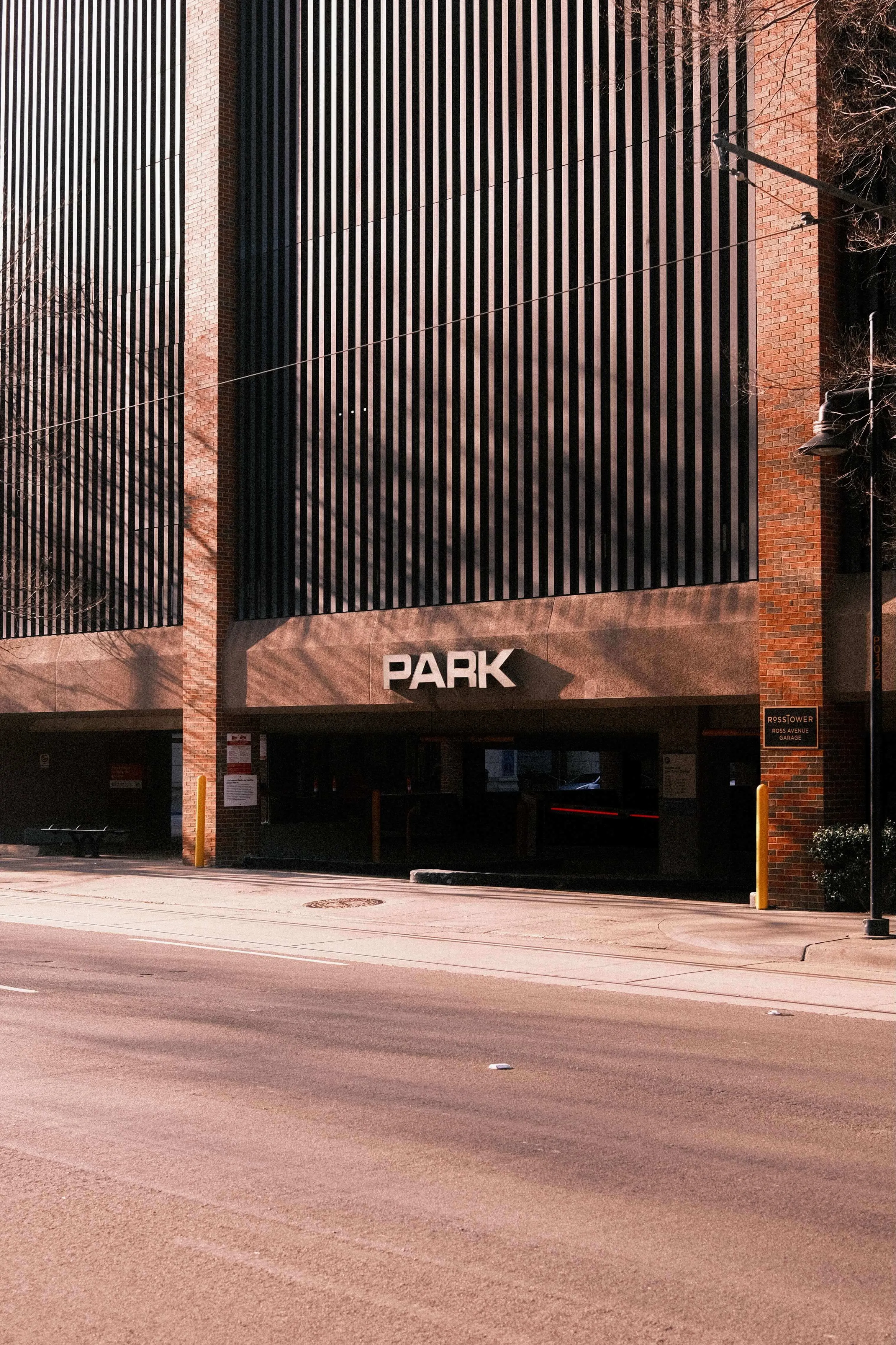 Multi story parking garage in downtown dallas with vertical slatted facade